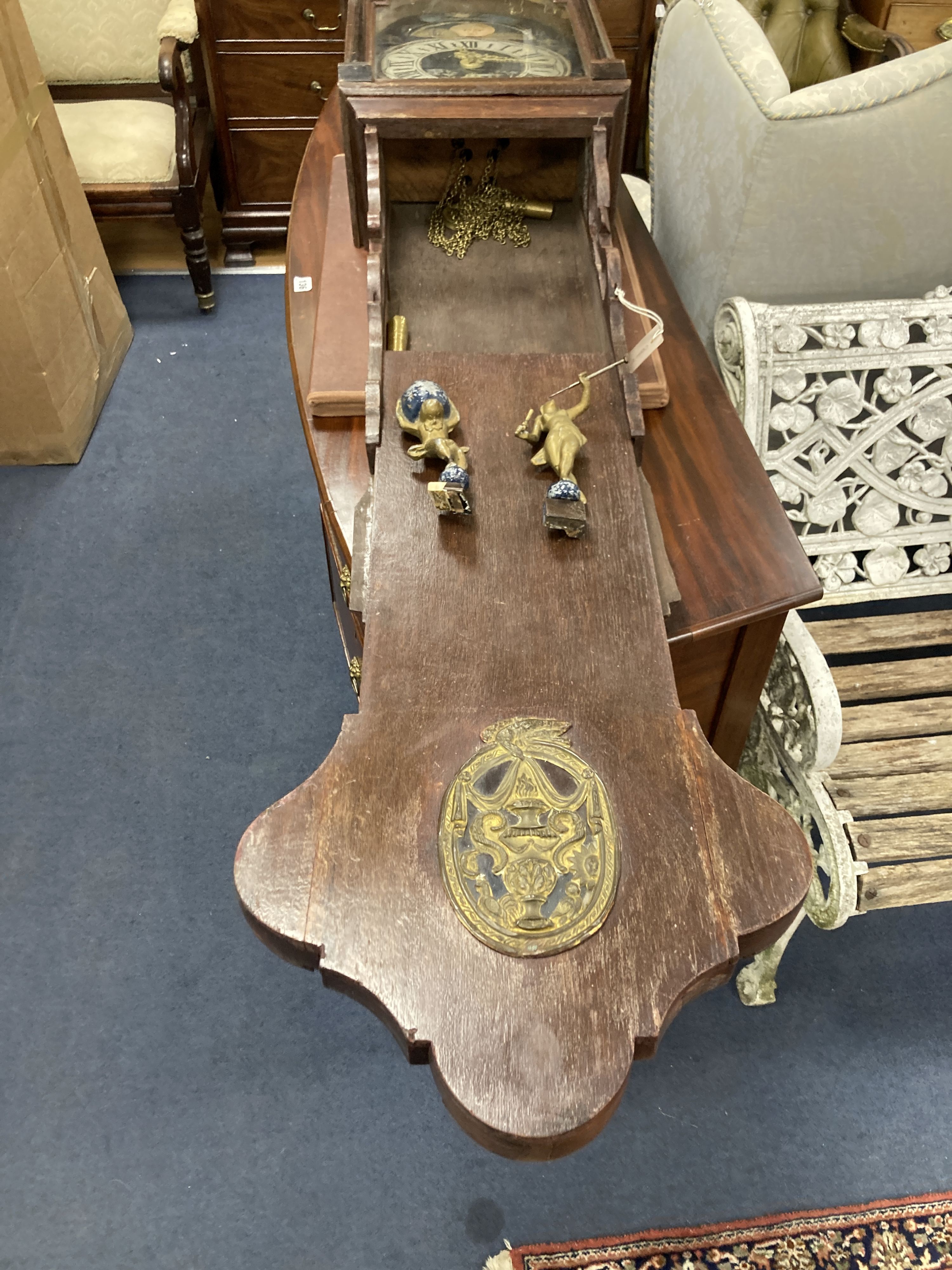 A wall clock with painted dial, height 132cm